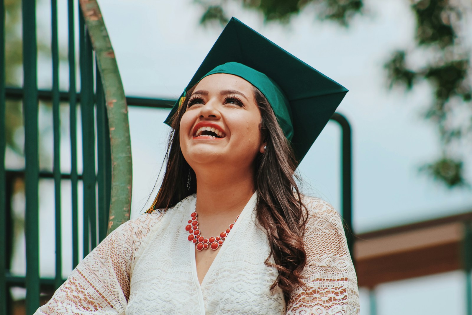Photo by Juan Ramos woman wearing black mortar board